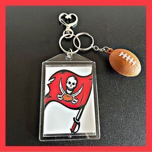 Buccaneers Football 🏈 Keychain includes Heart Shape Silver Medal Spring.